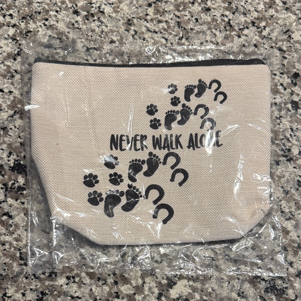 Beige Pouch with Black Paw Print Design